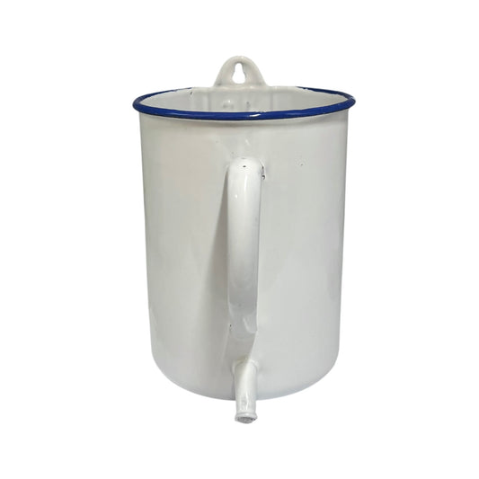 A white enamel mug with a blue rim, featuring a built-in handle and a small spout, shown against a plain white background.