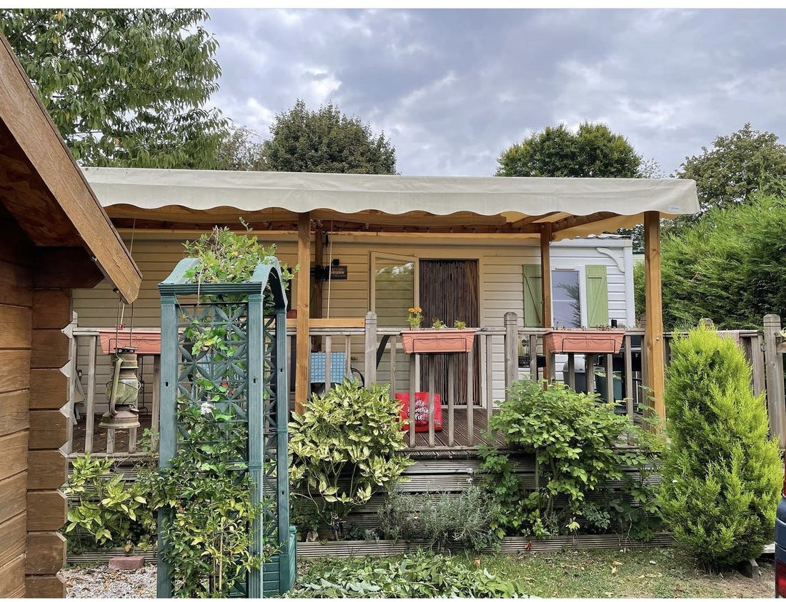 mobile home with veranda in a garden setting