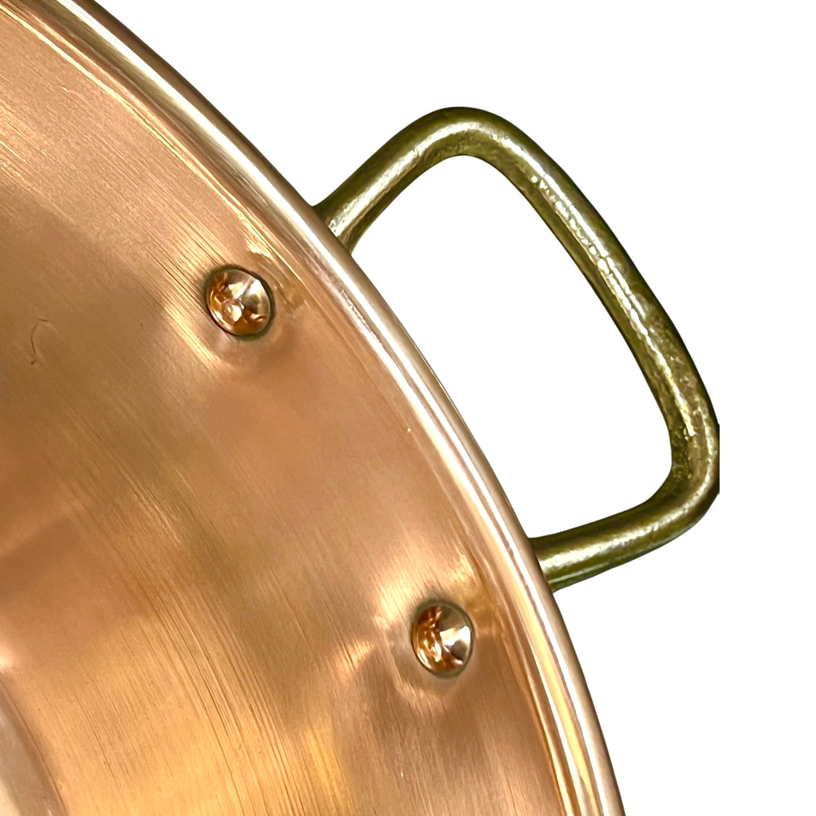 Copper sink edge with a brass handle on a white background 