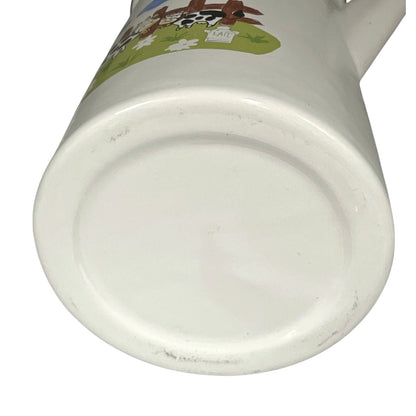 Close up of a French enamel coffee pot on a white background