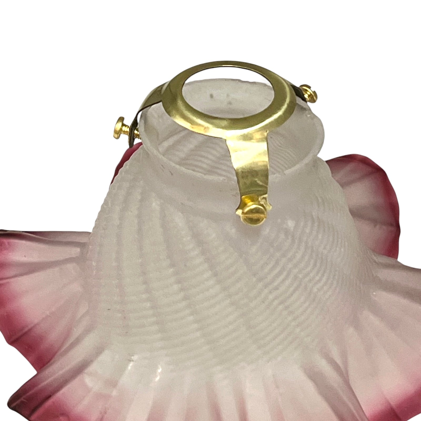 Decorative lamp with gold ring and pink floral design on a white background