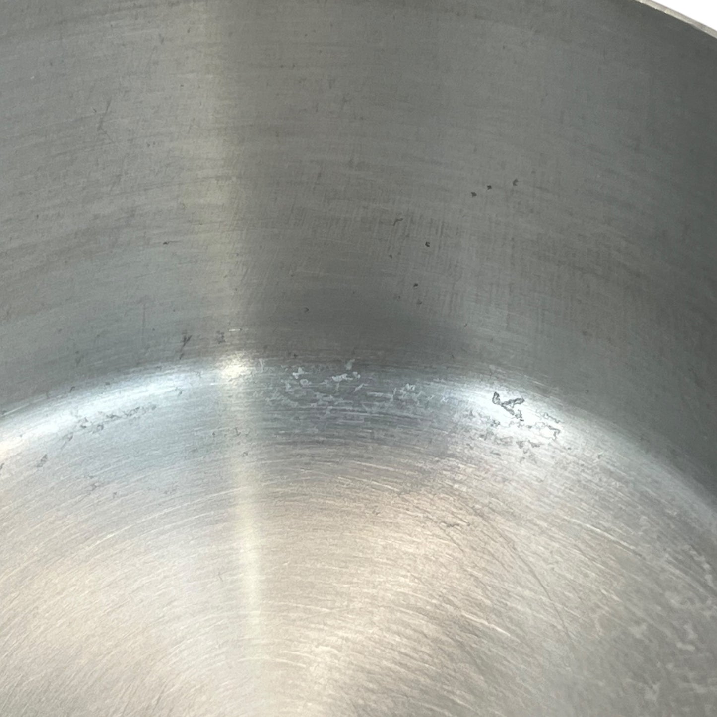 interior view of aluminium lined copper pan