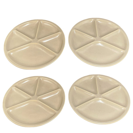 Four round divided plates in a light beige color, arranged in a 2x2 grid on a white background.