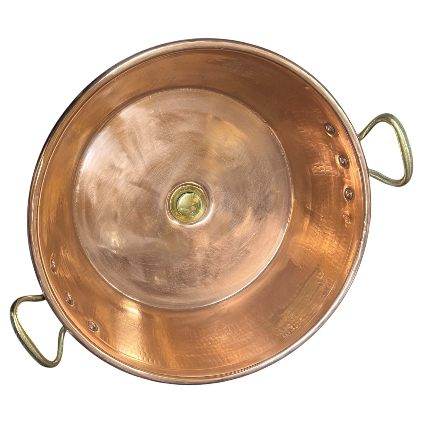 Copper sink with handles on a white background
