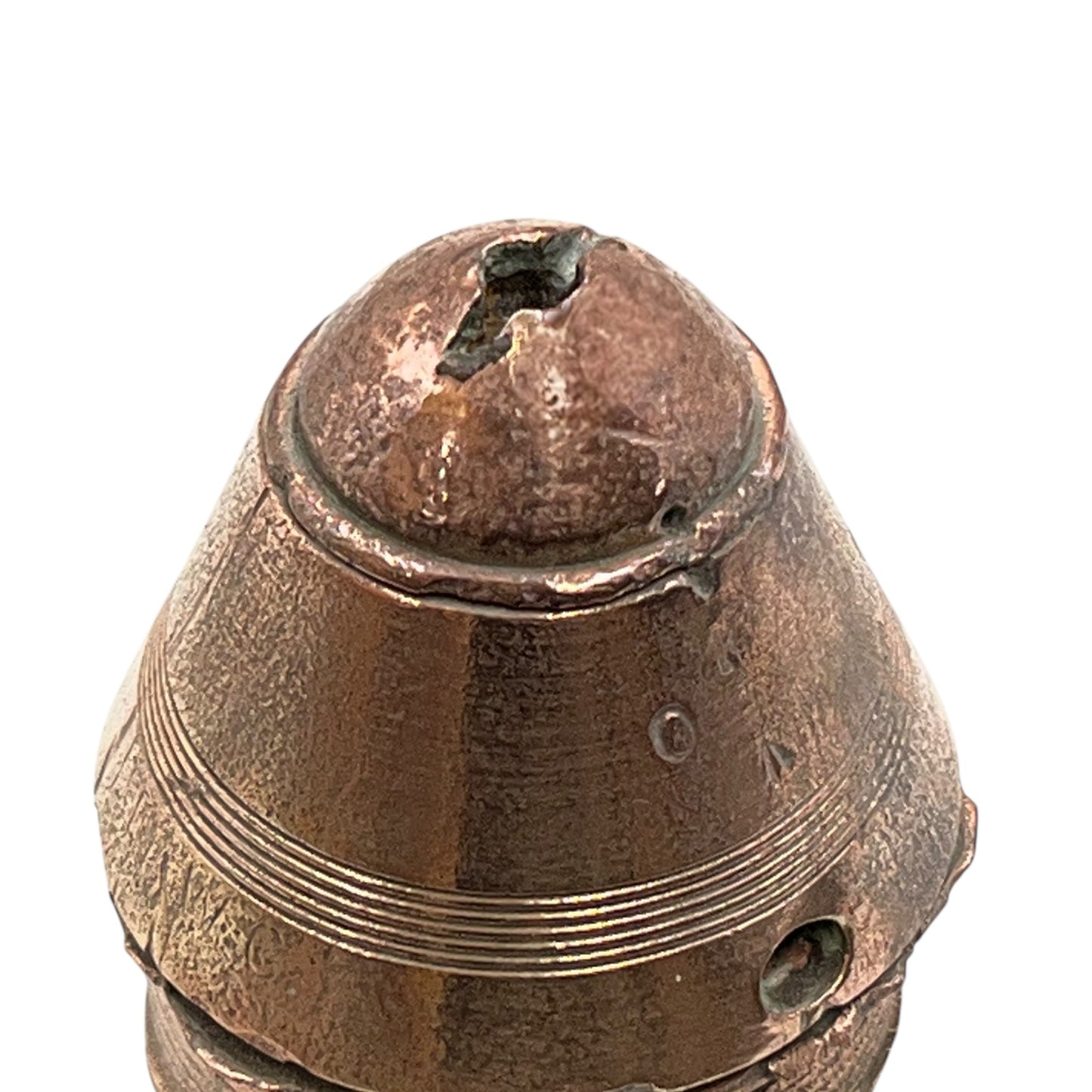 WW1 brass fuse paperweight on a white background