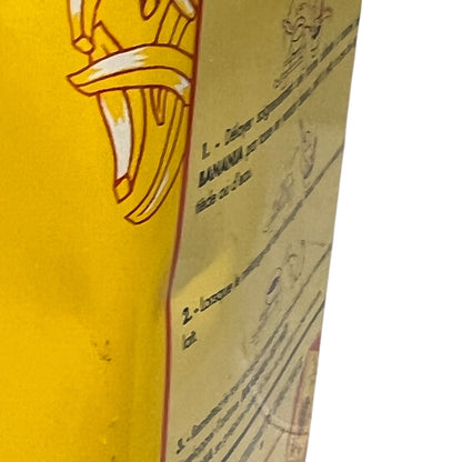 Close-up of a yellow box with text and illustrations on a white background