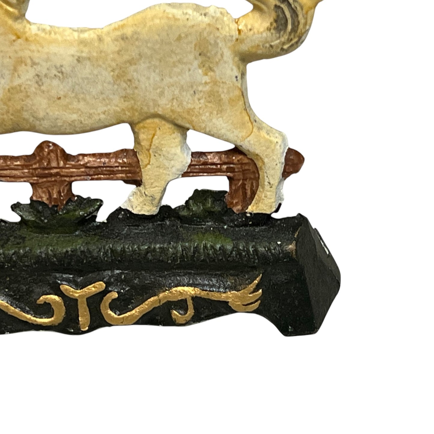 close up of a doorstop on a white background