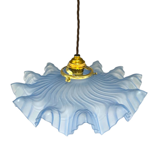 Vintage-style pendant light with a blue glass shade, a brass fitting and a brown twisted wire on a white background for sale from All Things French Store