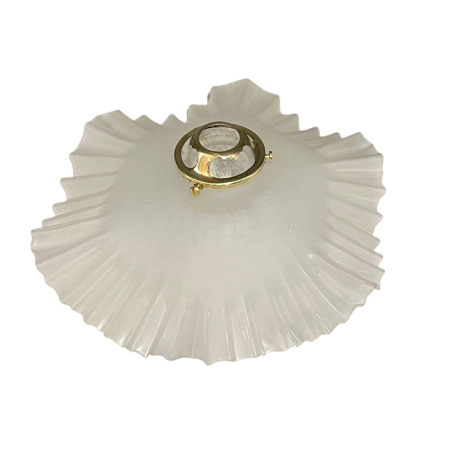 White ribbed lampshade with gold fixture on a white background