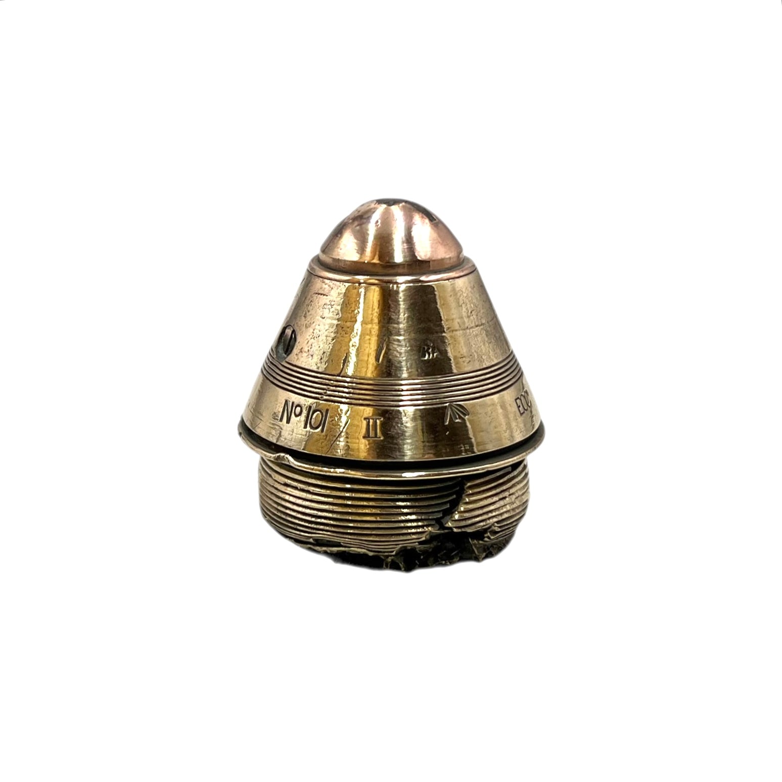 Polished British brass WW1 fuse or paperweight type 101 on a white background