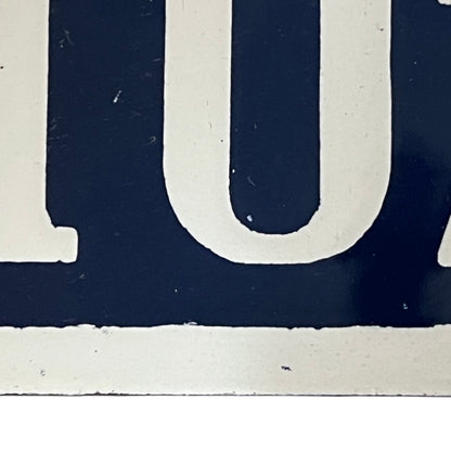 Close-up of a white number on a dark blue background