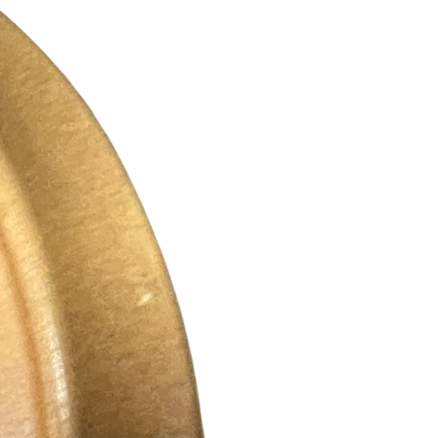 Close-up of a brown plate rim on a white background