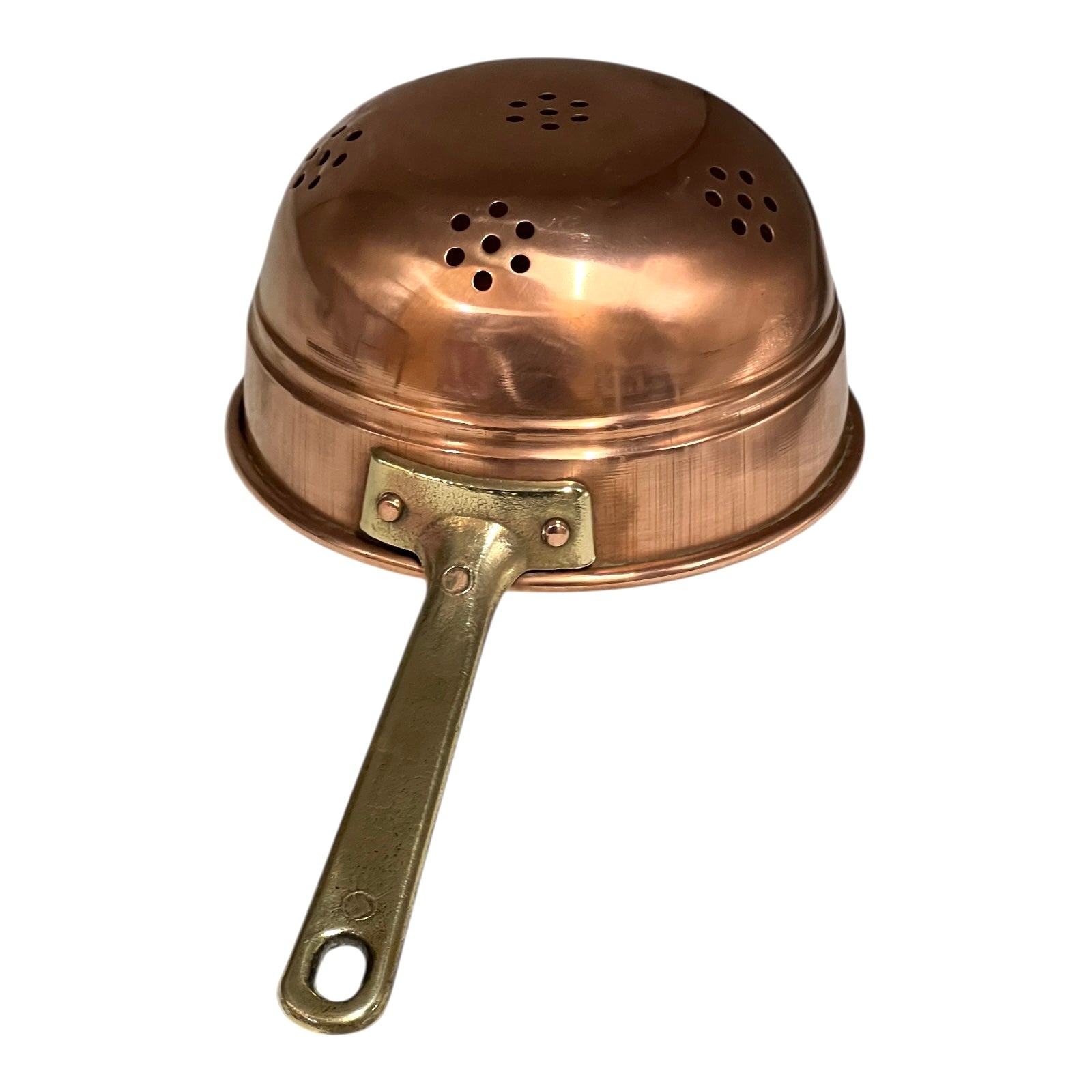 Small copper French sieve with a brass handle on a white background