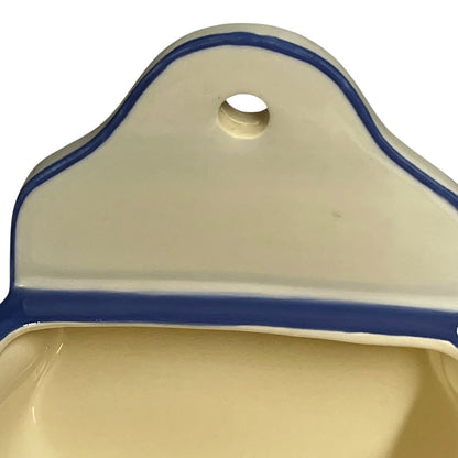 close up of hanging hole for ceramic pot 