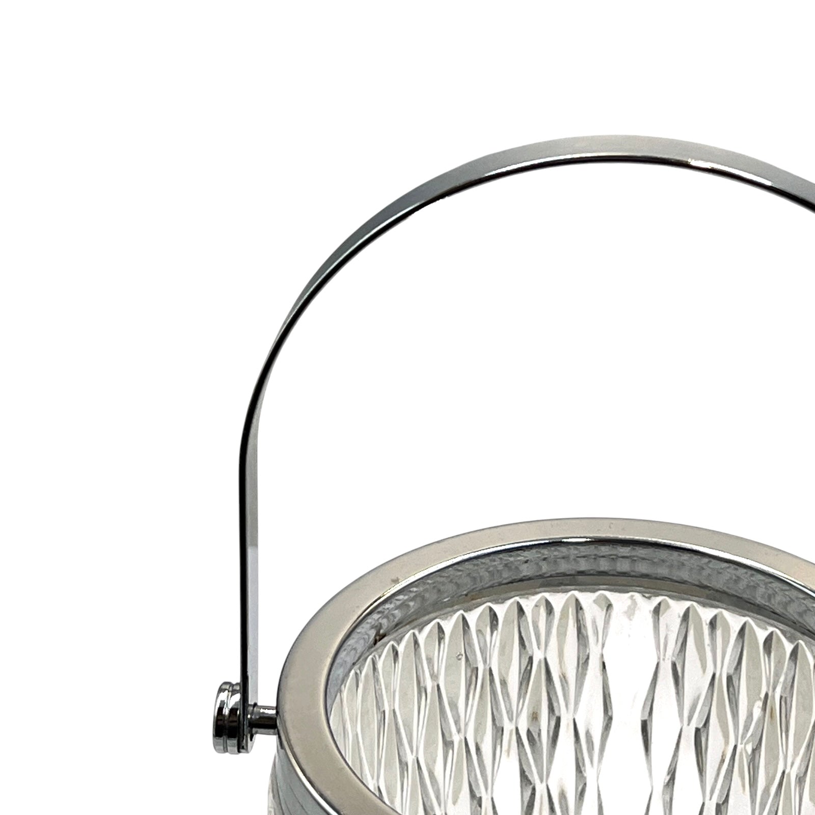 Close up of a French vintage glass ice bucket with a silver coloured collar and a handle on a white background 