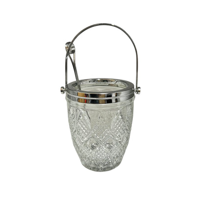 Clear glass ice bucket with silver scoop and handle on a white background