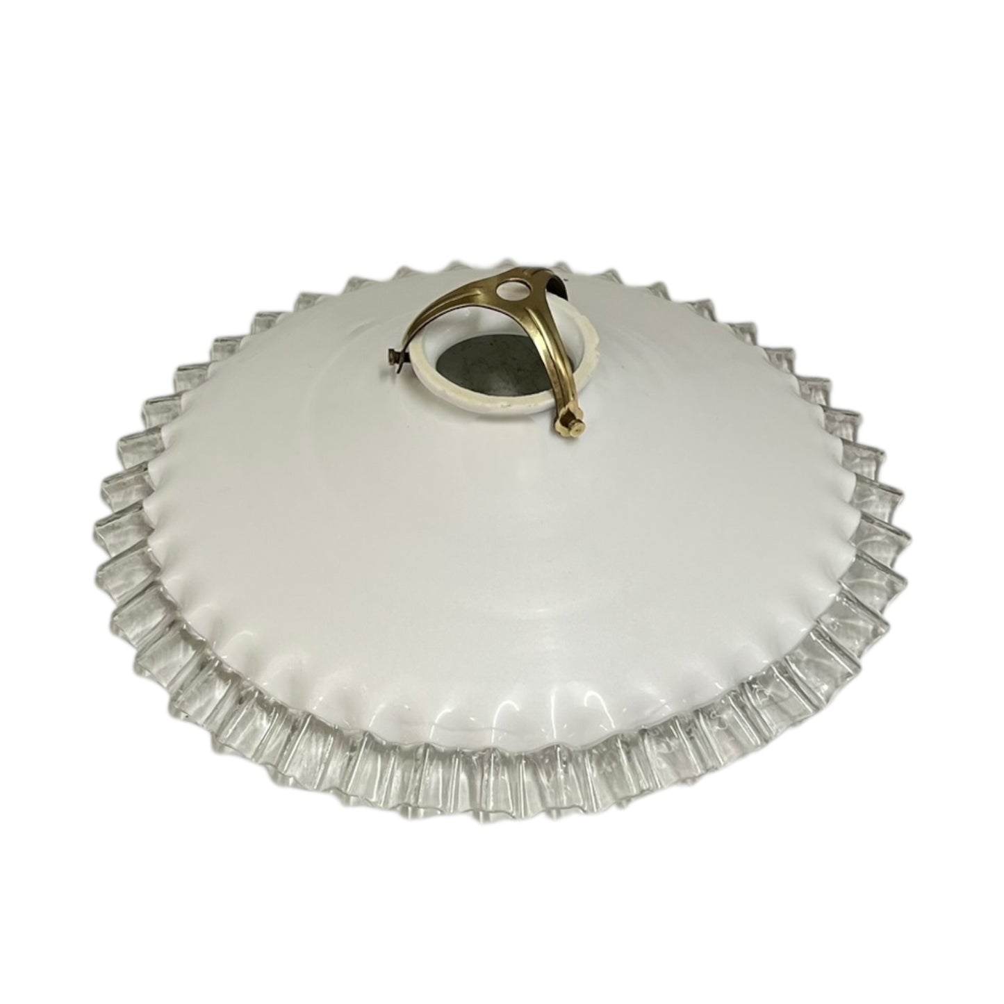 White glass lampshade with a gold fixture on a white background
