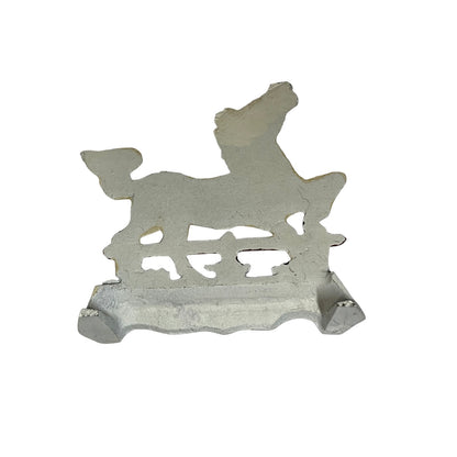 A rustic, weathered metal horse-shaped wall hook or shelf bracket with a distressed, peeling paint finish, shown against a plain white background.