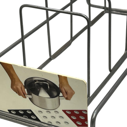 Metal rack with a container on a white background