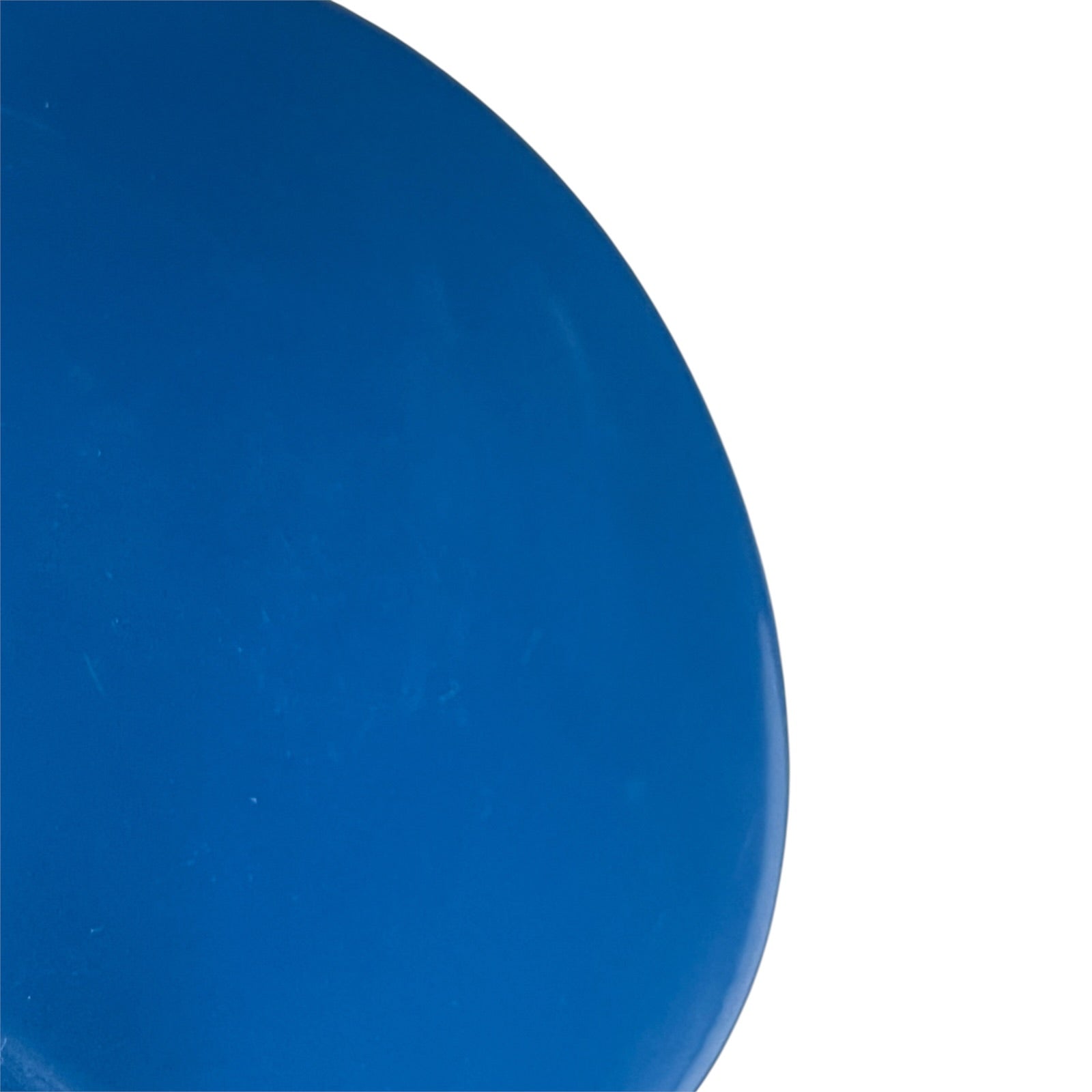 A close-up of a smooth, glossy blue circular object against a solid white background.