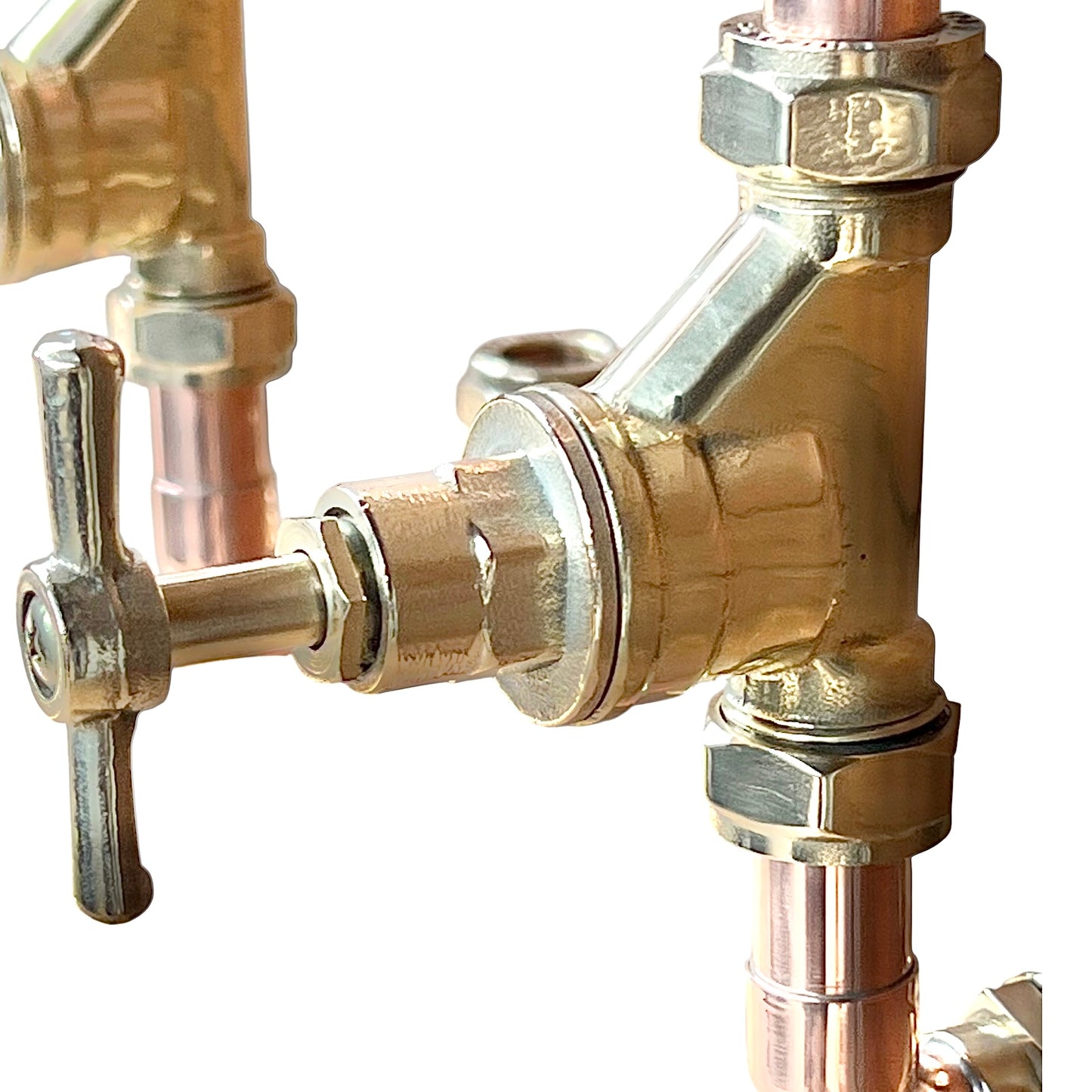 close up of copper and brass tap fitting on a white background 