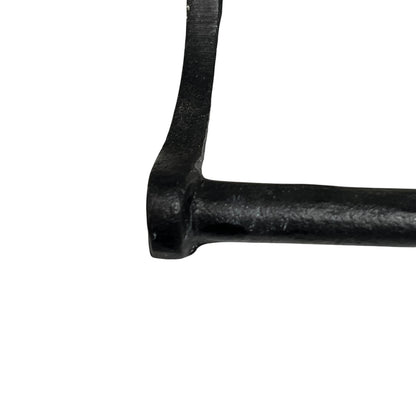 Close-up of a cow toilet roll holder on a white background