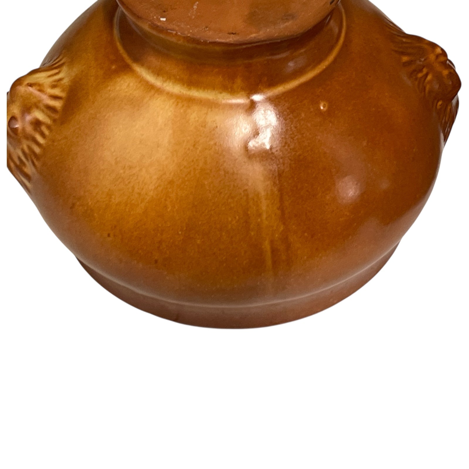 Brown ceramic bowl on a white background