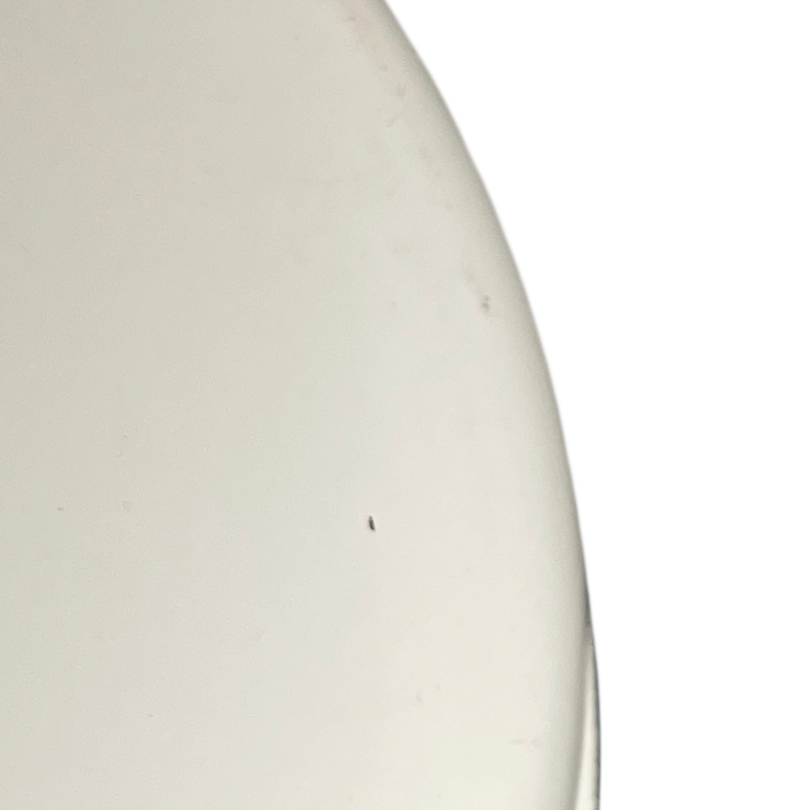 Close-up of a white frying pan on a white background