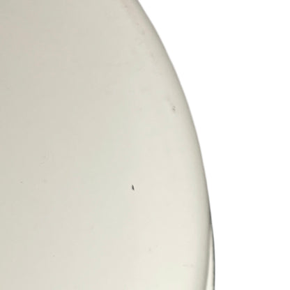 Close-up of a white frying pan on a white background