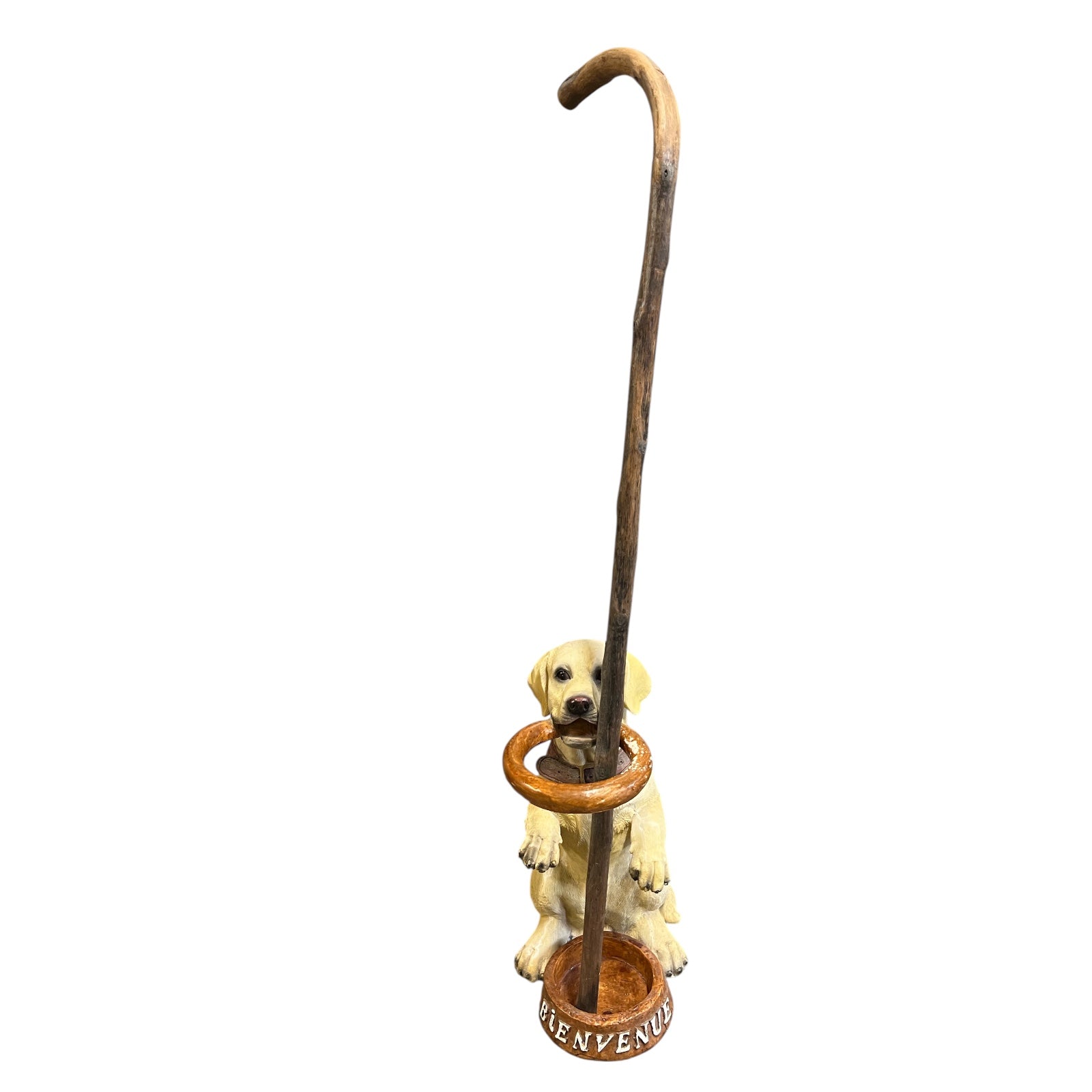 Decorative umbrella stand with a dog and walking cane on a white background