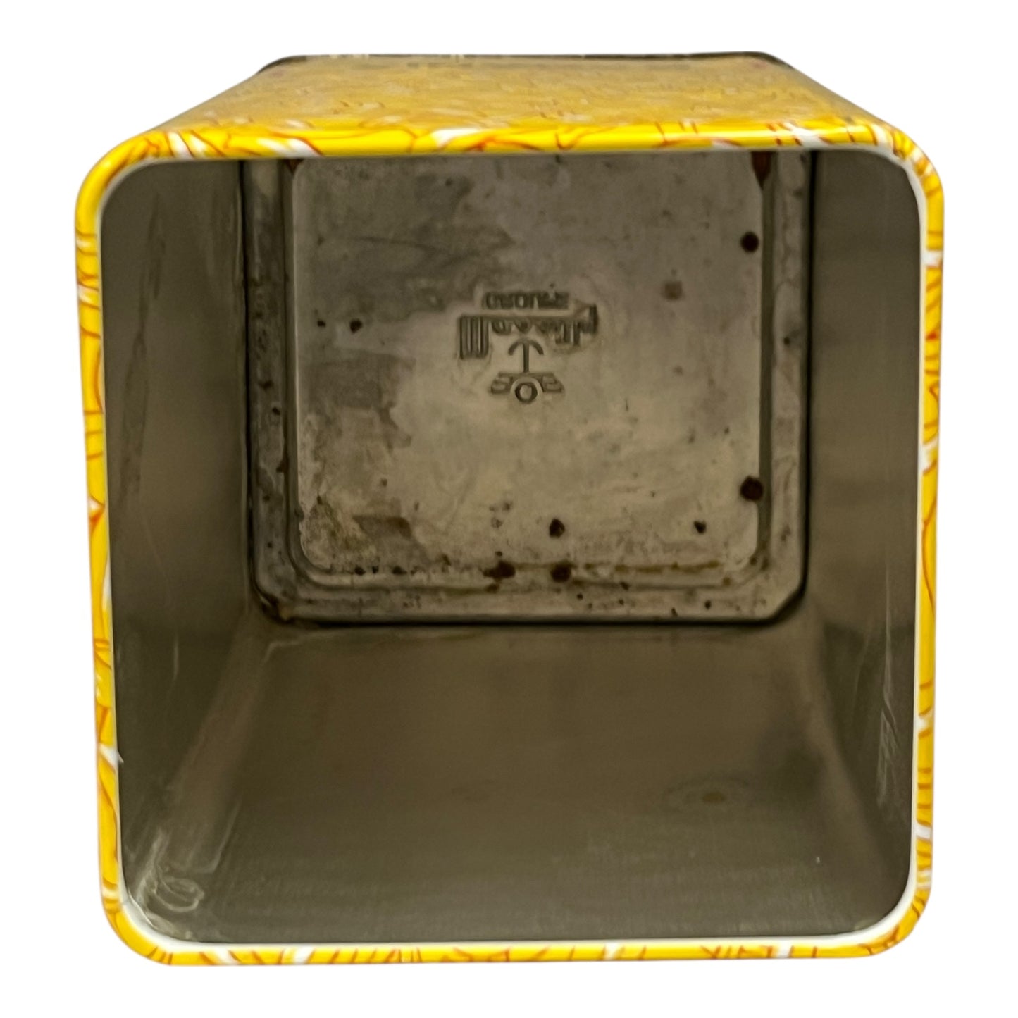 Metal box with yellow rim on a white background
