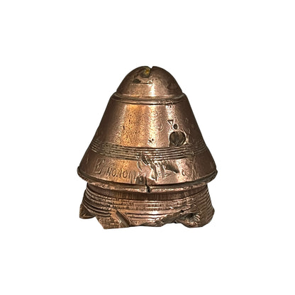 WW1 brass fuse paperweight on a white background 