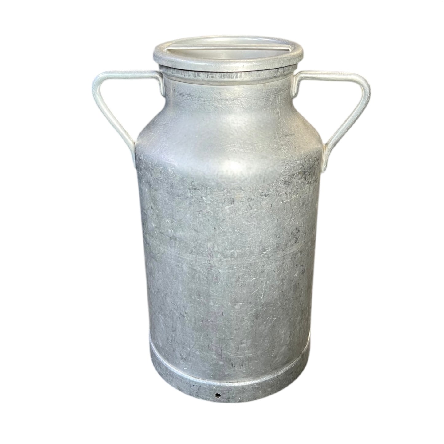 Metal milk churn on a white background