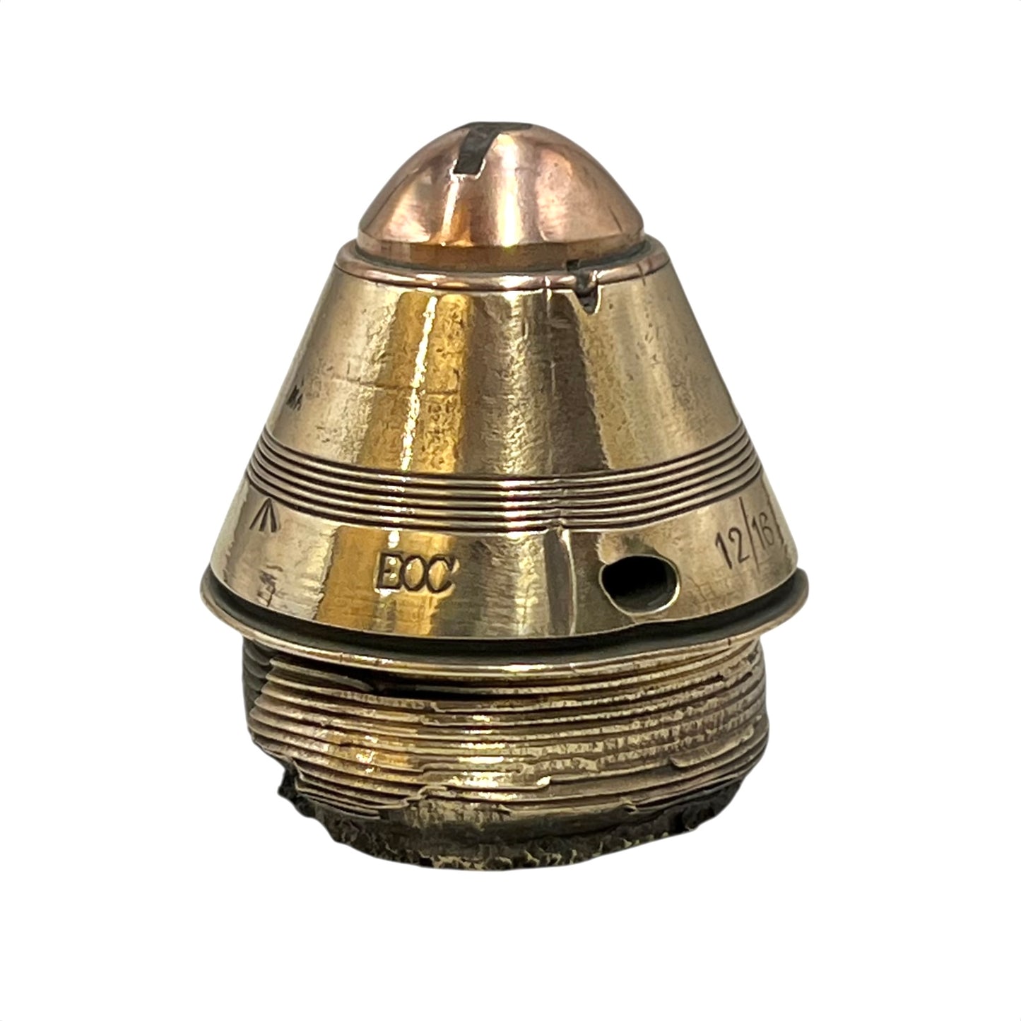 Polished British brass WW1 fuse or paperweight type 101 on a white background