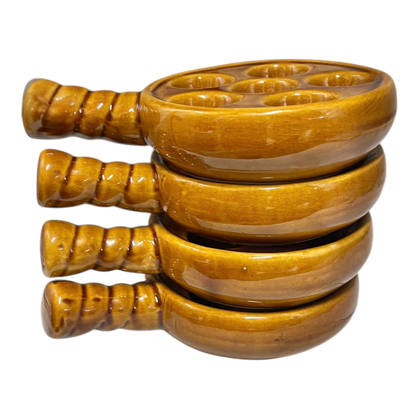 French brown ceramic escargots pots with multiple compartments on a white background