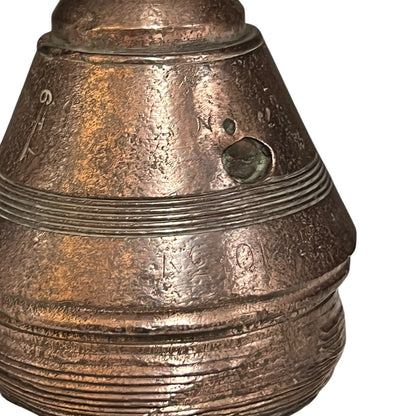 Brass metal cap fuse on a white background