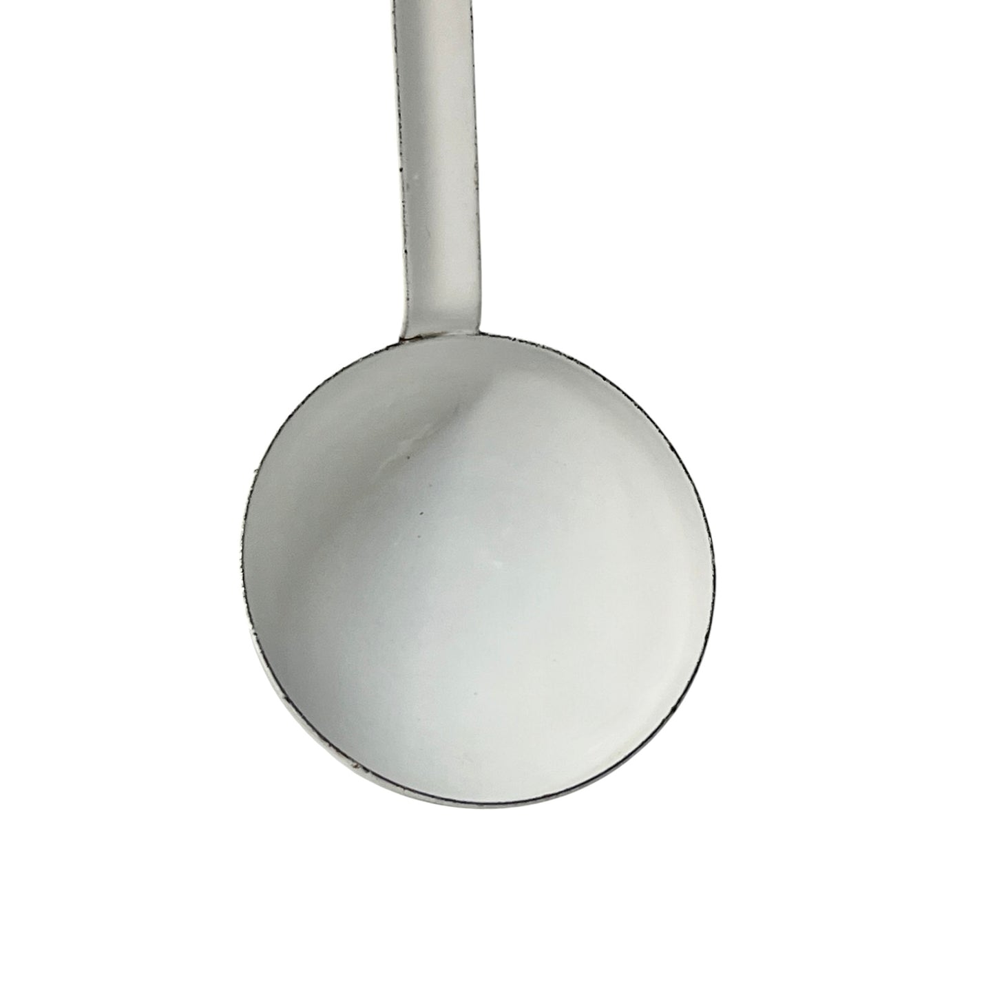 close up of a vintage kitchen utensil on a white background