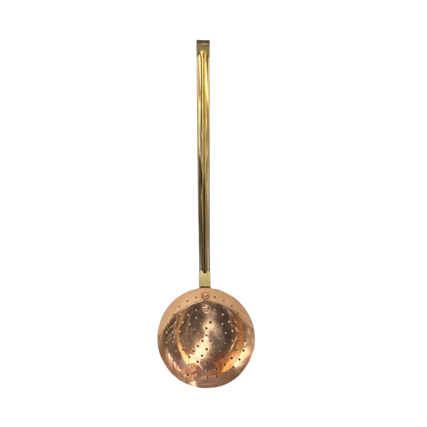 French vintage copper slotted spoon with a brass handle  on a white background