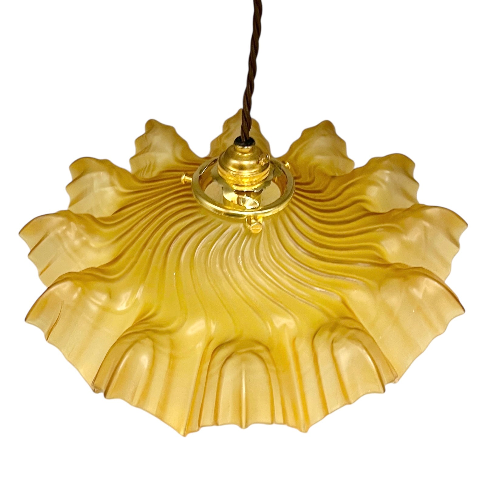 Amber coloured vintage French  pendant light with a scalloped design on a white background