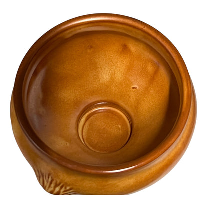 Brown ceramic bowl on a white background