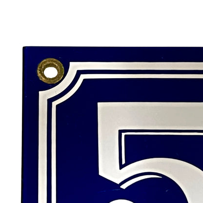 Decorative number '5' on a blue background with gold accent