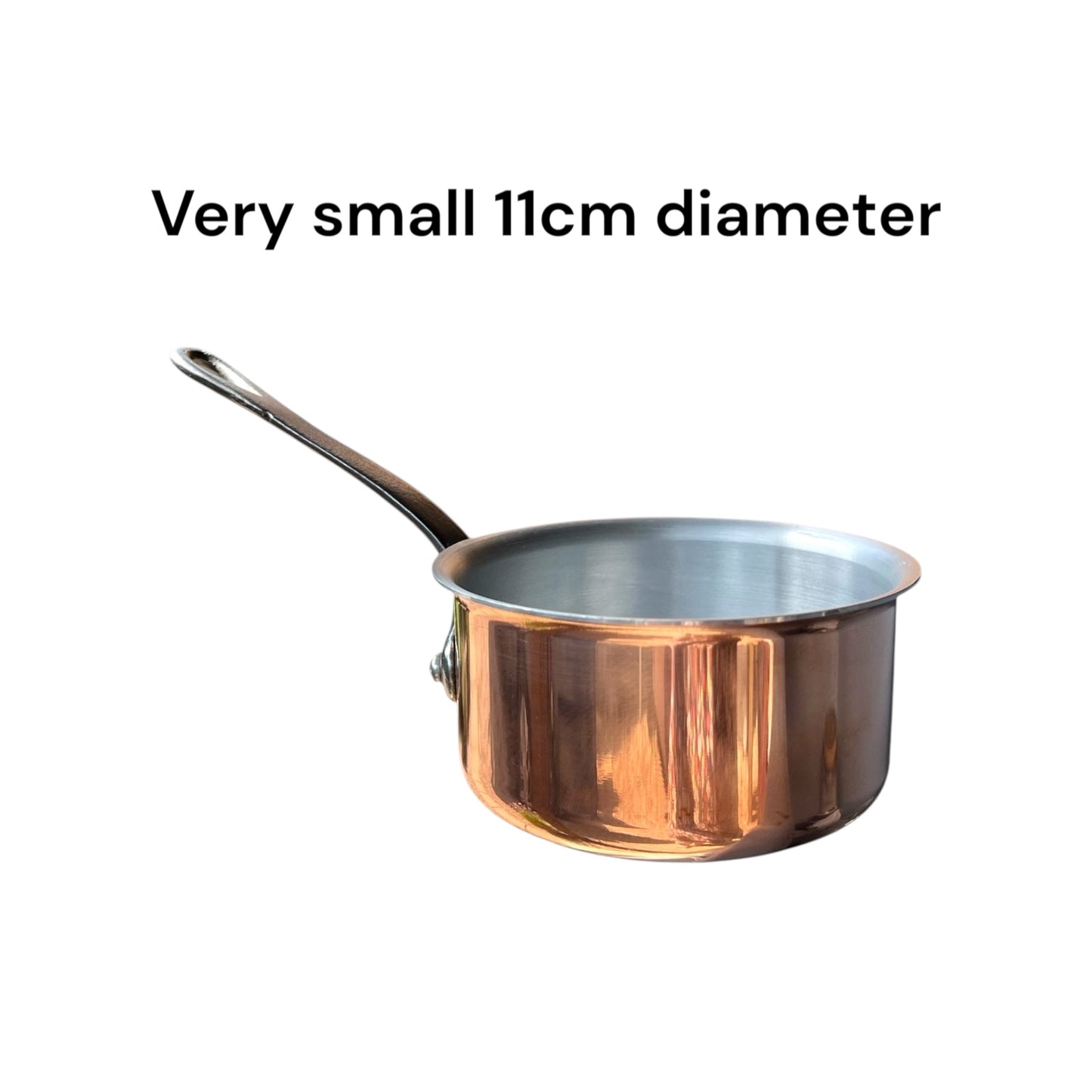 Copper saucepan with a metal handle on a white background