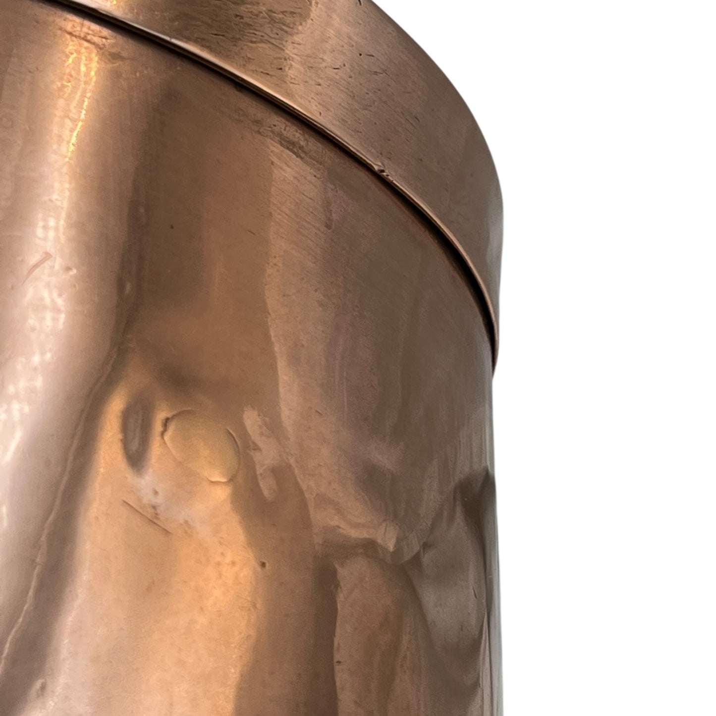 Close up of a copper cooking pot stockpot with handles on a white background