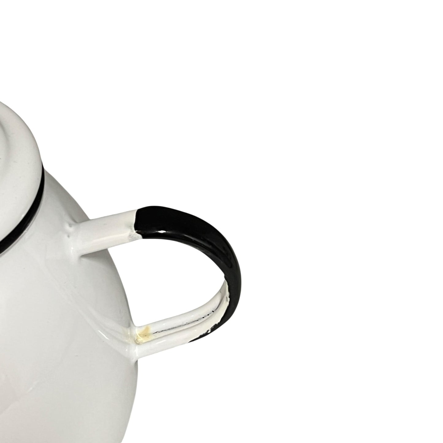 White teapot with black handle on a white background