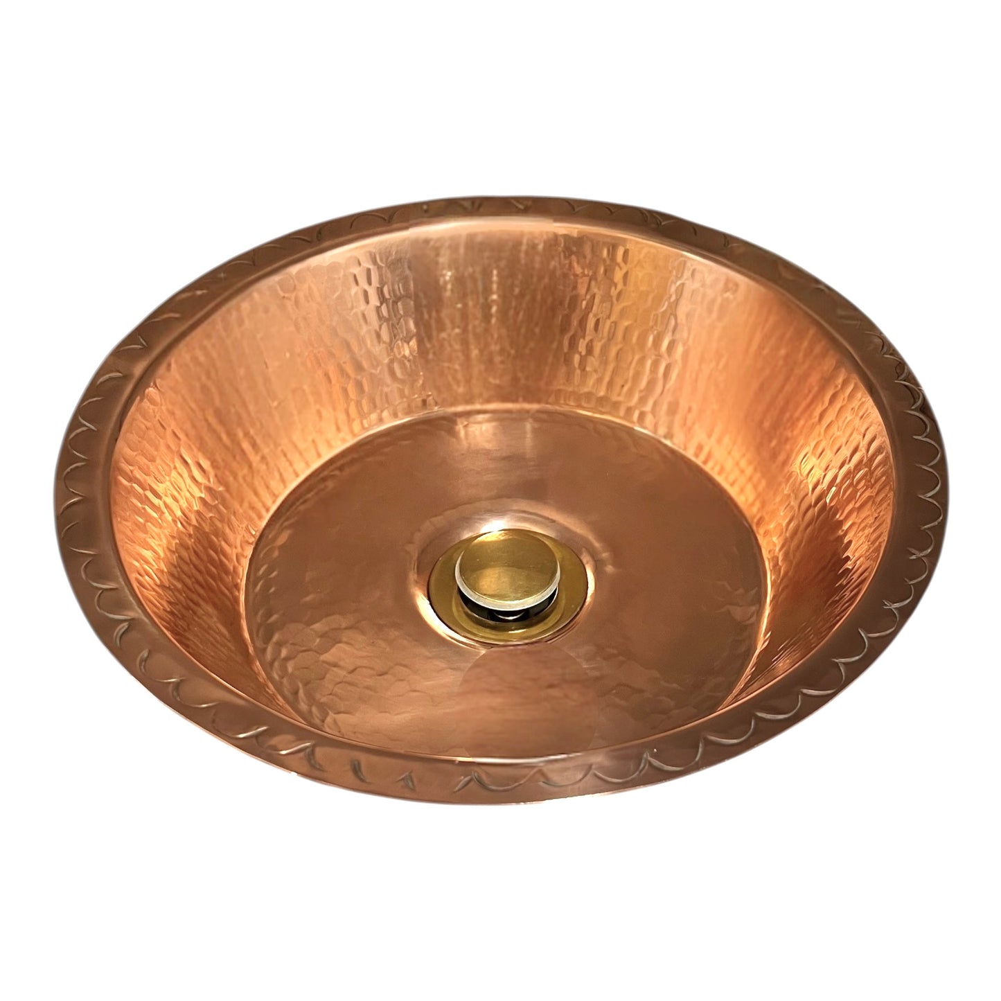 Copper sink with textured surface on a white background