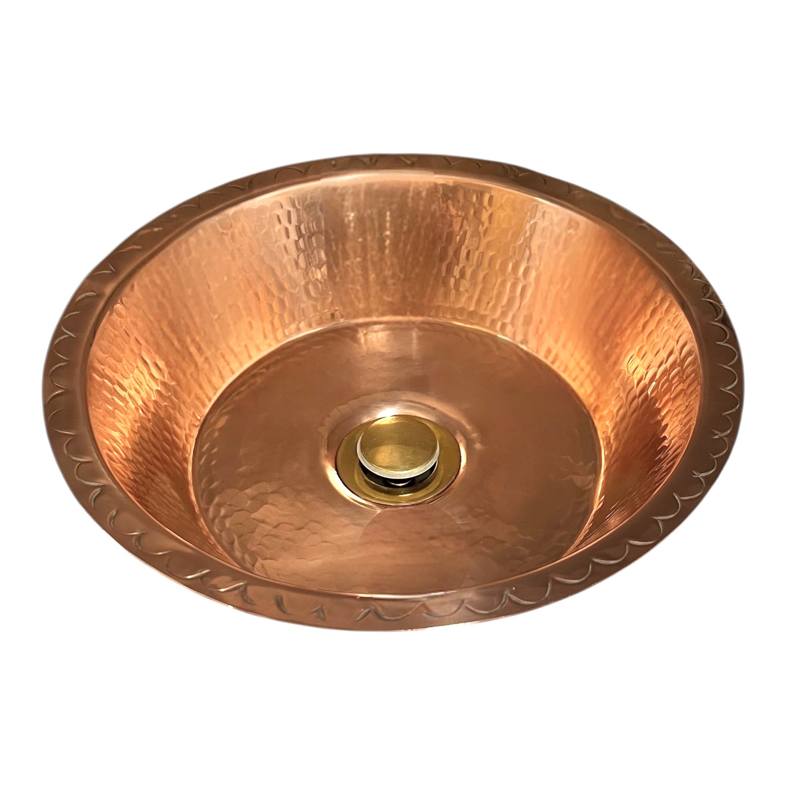 Copper sink with textured surface on a white background