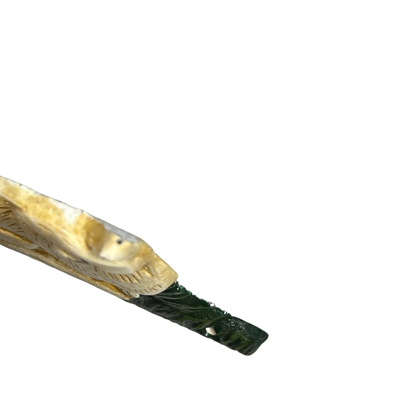 Close up of a cat toiler roll holder on a white background 