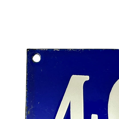 Blue sign with white l403 on a white background
