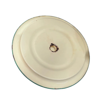 Close up of a French enamel bucket on a white background 