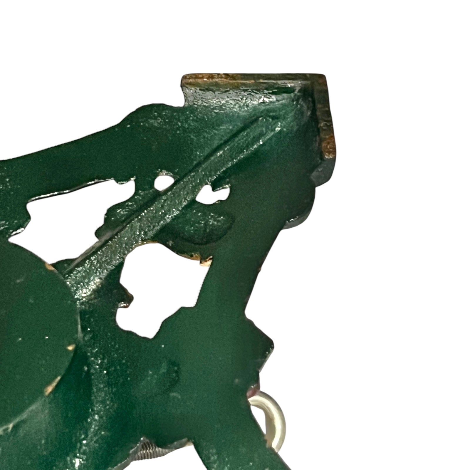 Close up of cast iron Christmas Tree holder on a white background